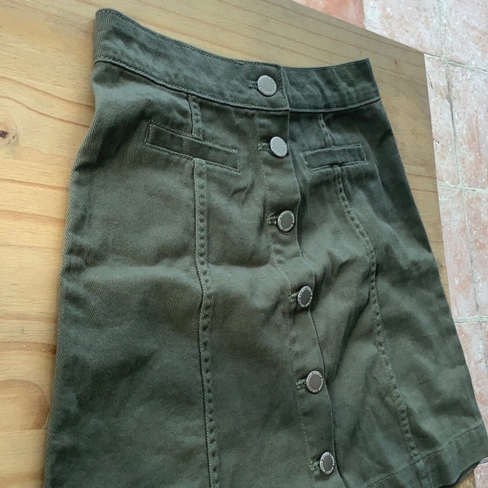 Green button skirt
